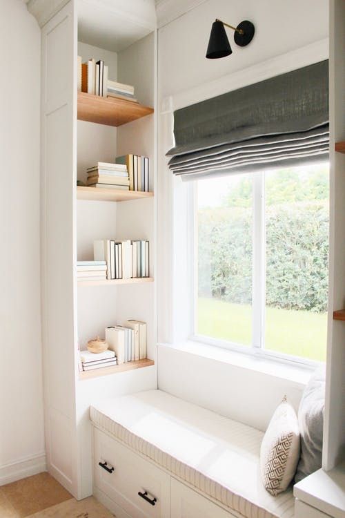 window seat with floating shelves 