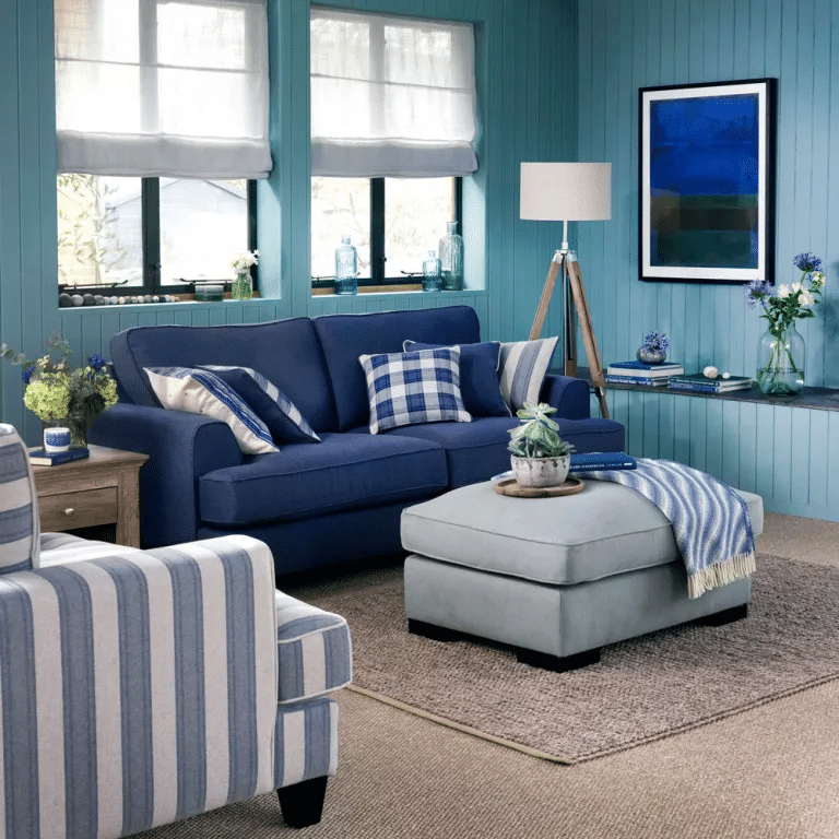 coastal living room with navy blue sofa 