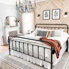 Metal Bed and Shiplap Wall