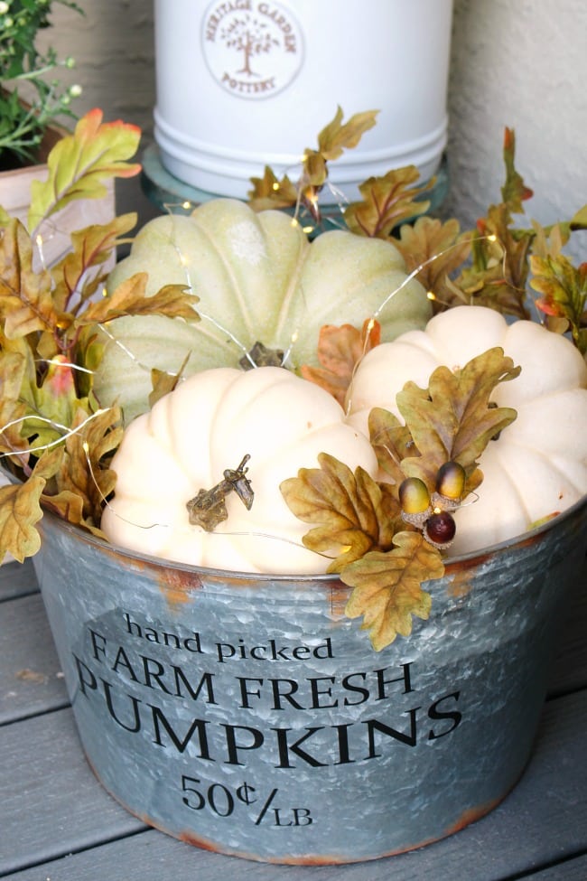 Pumpkins in a galvanized bucket from Clean and Scentsible