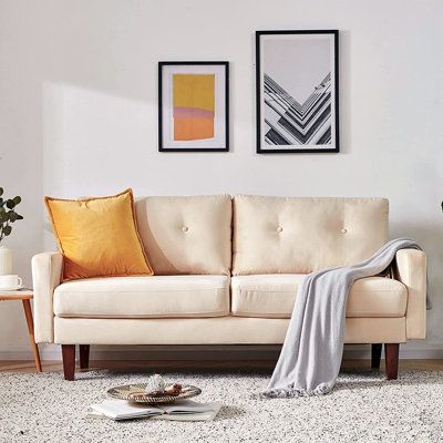 Beige Slipcovered Sofa