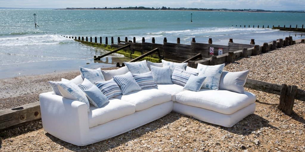 What Types of Materials Are Typically Used in Crafting Coastal Sofas