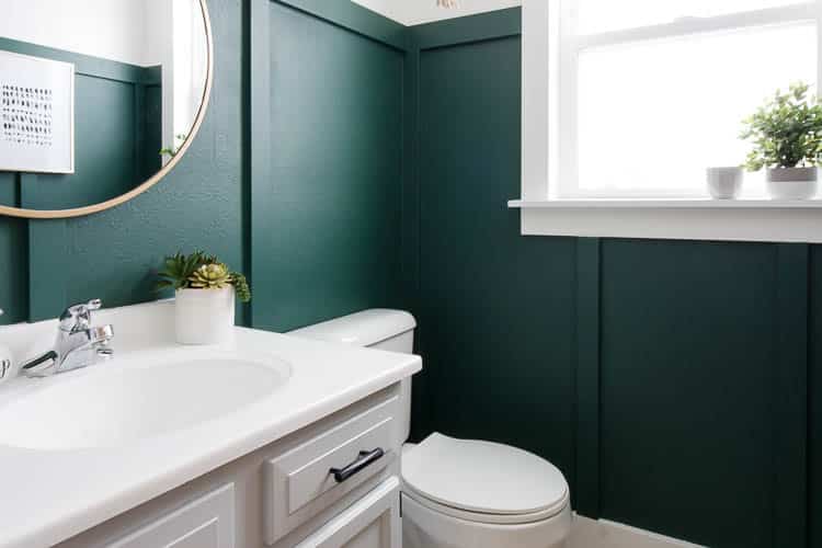 What Are Some Design Ideas for a Dark Green Bathroom?