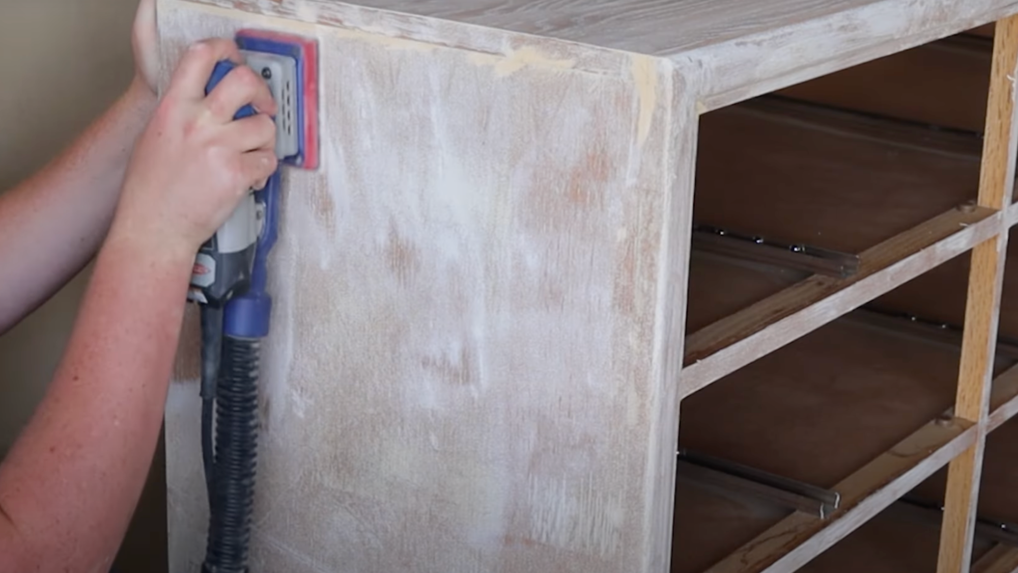 sanding the furniture