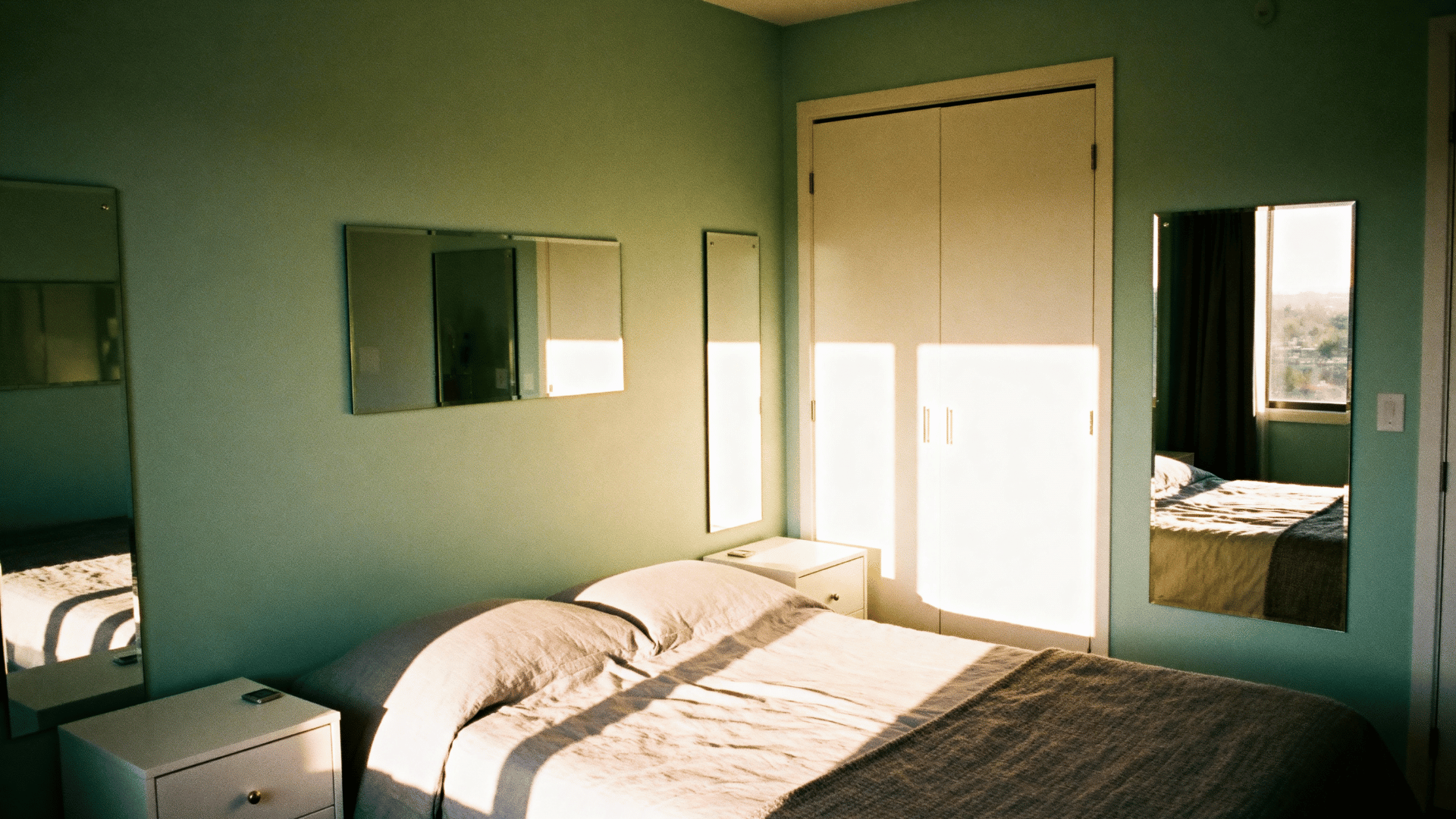 Small Sage Green Bedroom with Mirrors