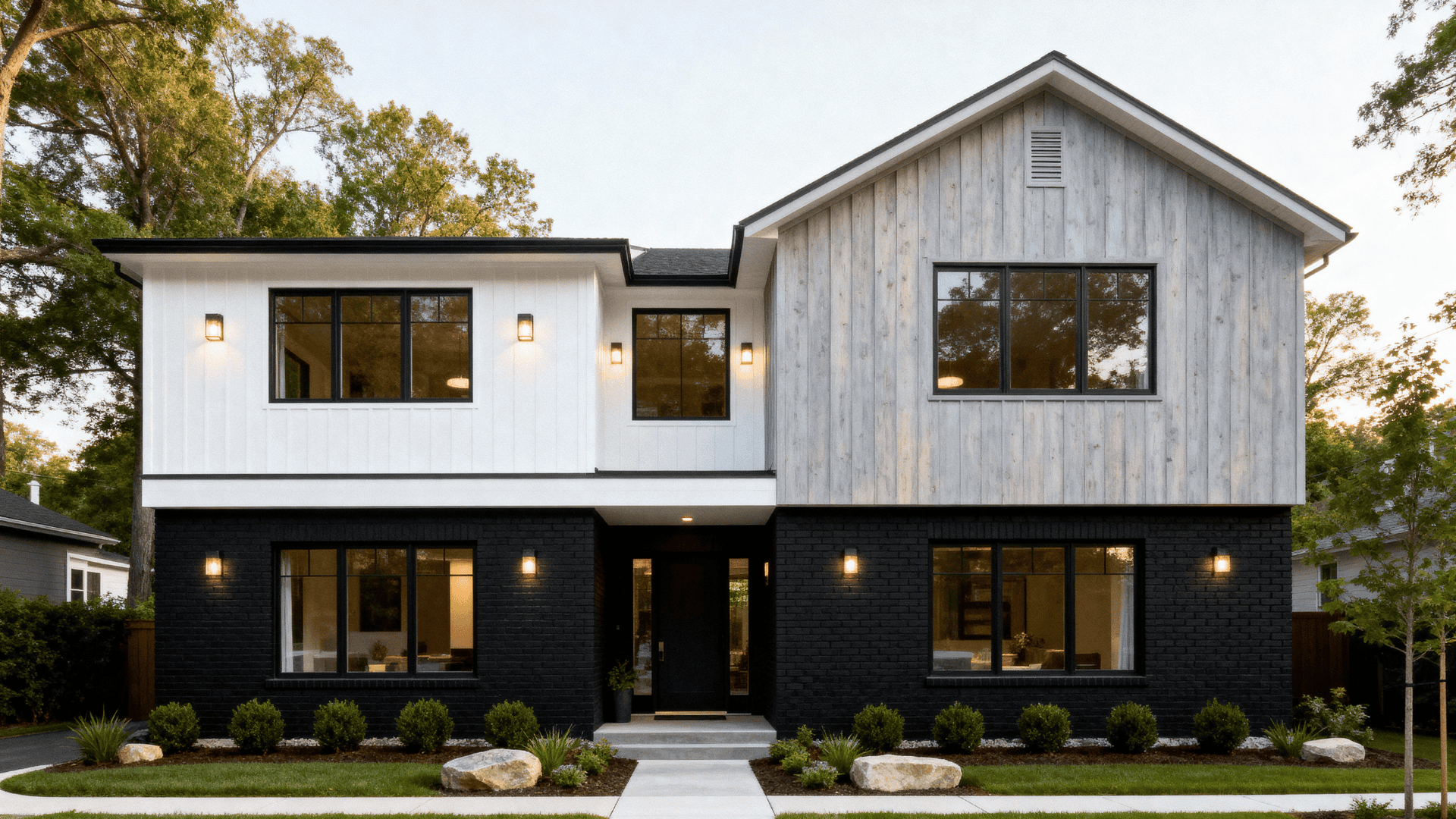 black brick lower level with light upper story