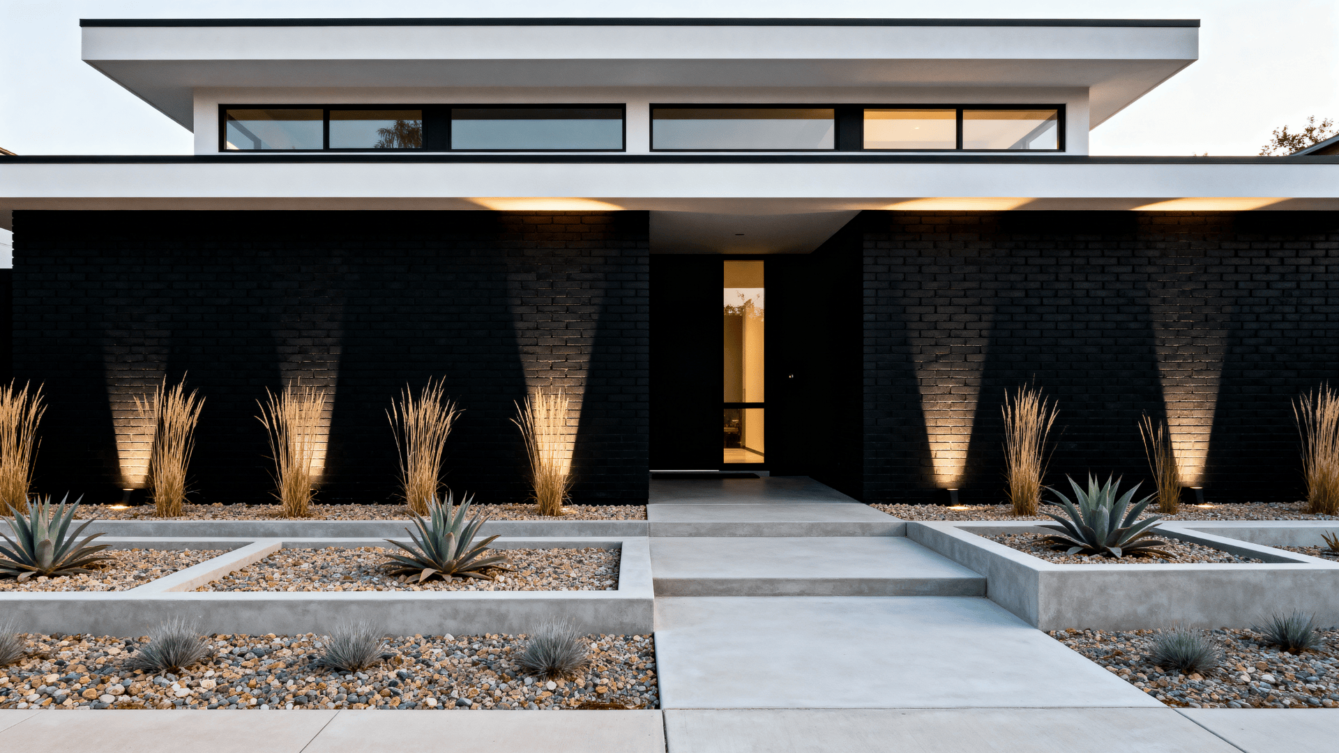 black brick with minimalist landscaping