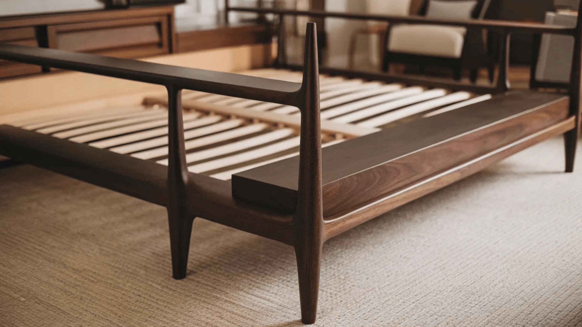 close up of a modern wooden bed frame with sleek, minimalist design and sturdy slats