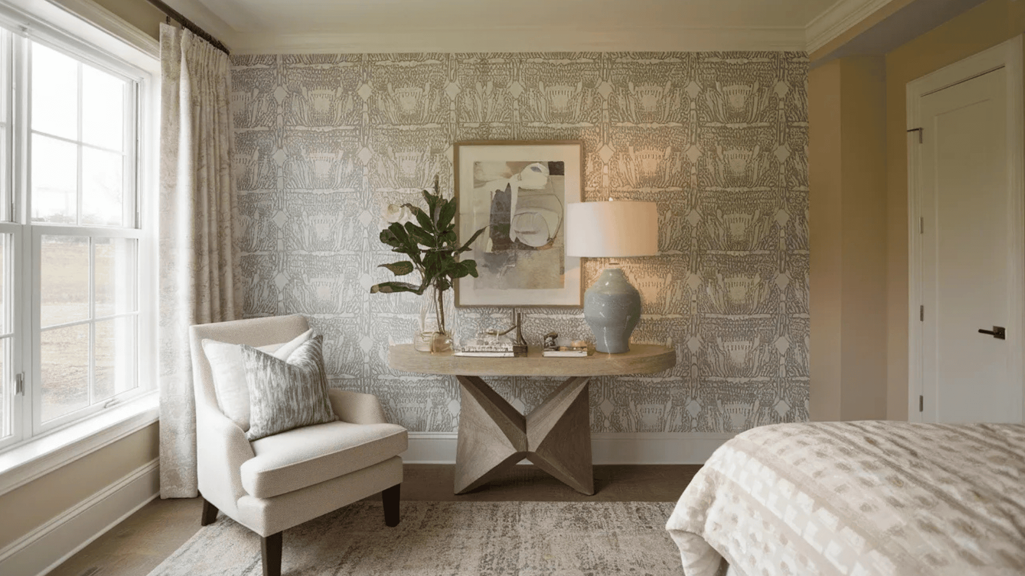close up of patterned wallpaper in a guest bedroom, adding texture and style to the space