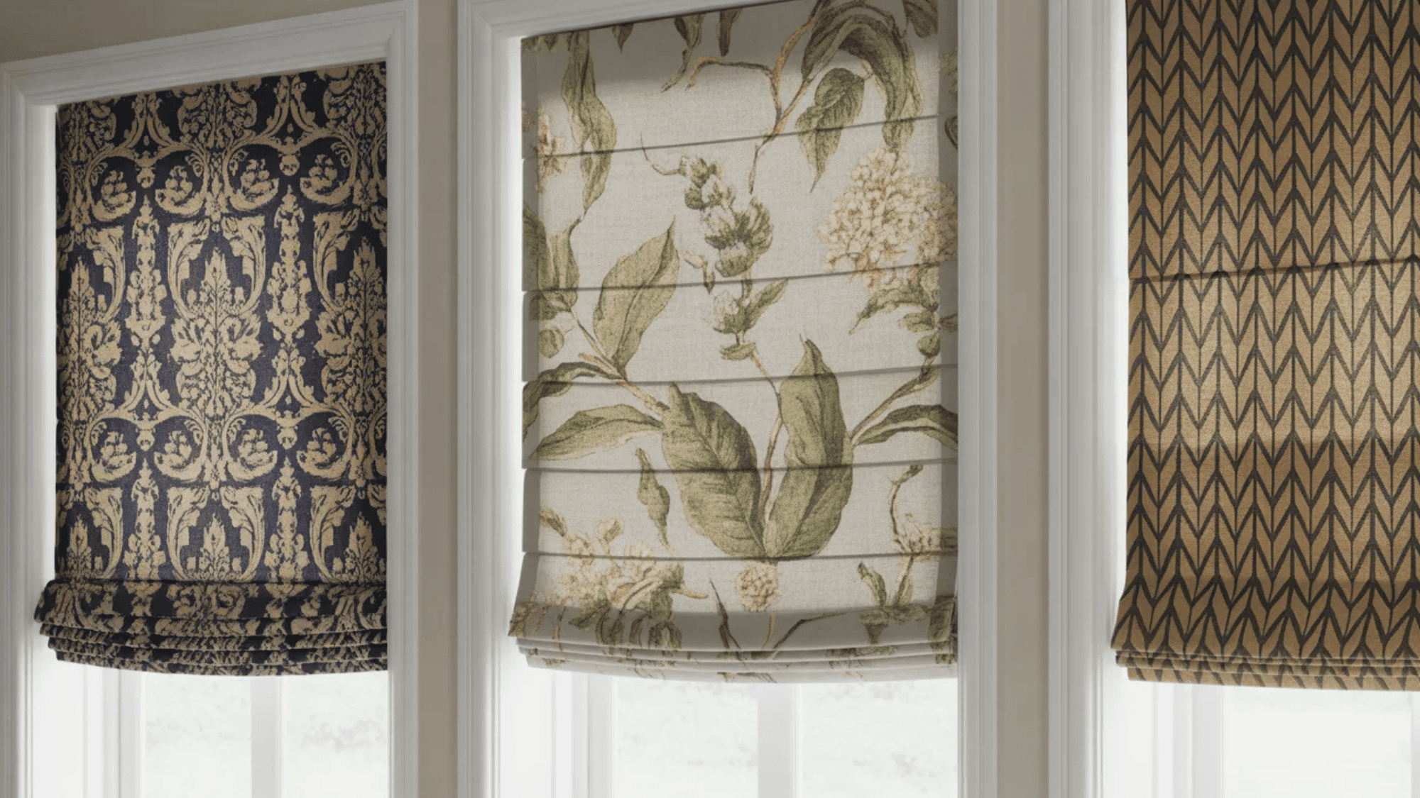 printed Roman shades in various patterns, including floral, damask, and geometric designs, enhancing the windows with vibrant colors and textures