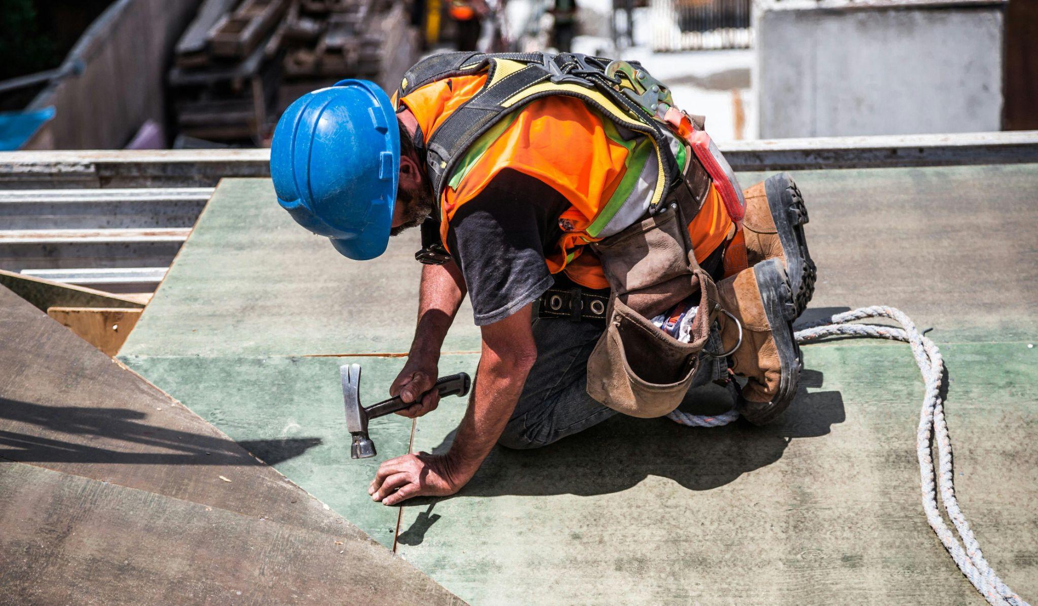 Construction worker using a hammer.