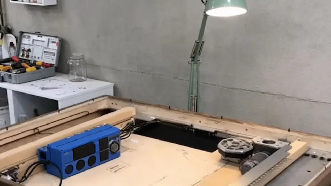 Banksy shredded painting in frame, showing hidden shredder mechanism