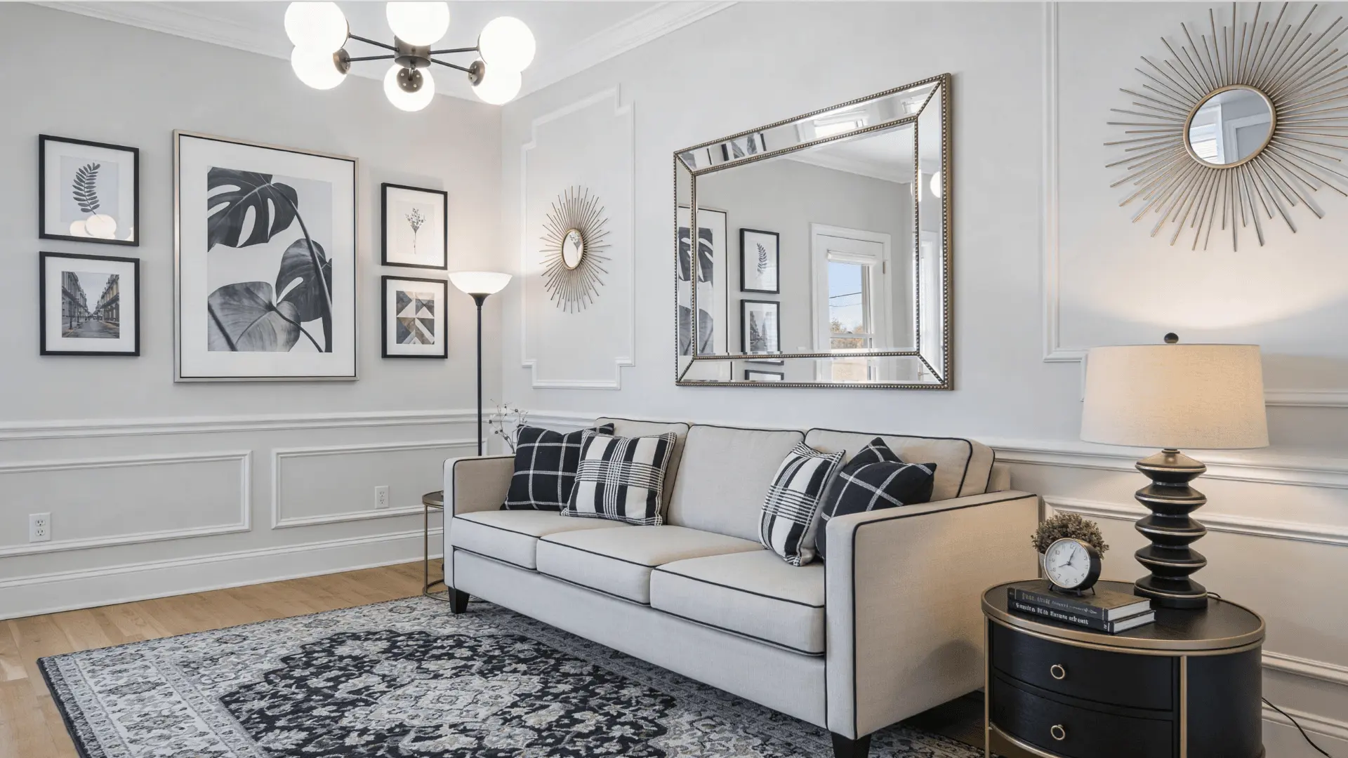Drawing room with wall art mirror rug and lighting fixtures arranged in a clean and balanced interior setting