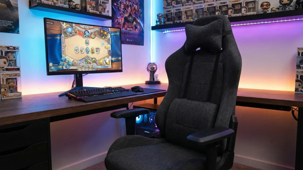 high-back gaming chair with lumbar support at a gaming desk setup with monitor and keyboard in a gaming room