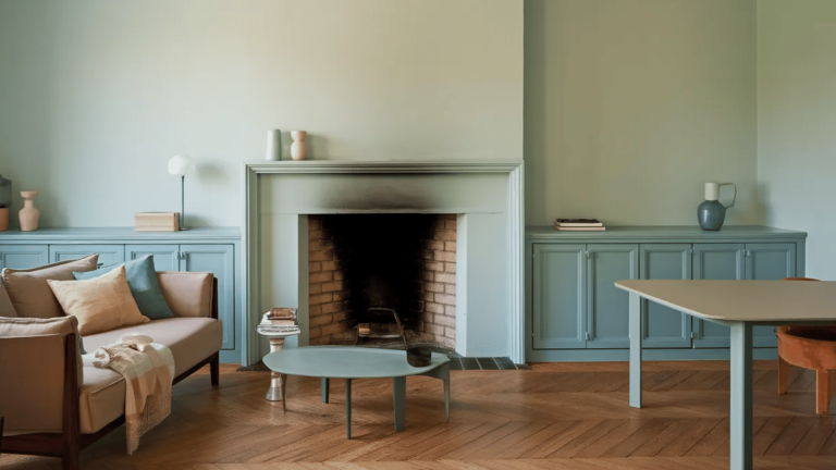 modern living room with soft pastel colors, minimalist furniture, and a clean, calm atmosphere