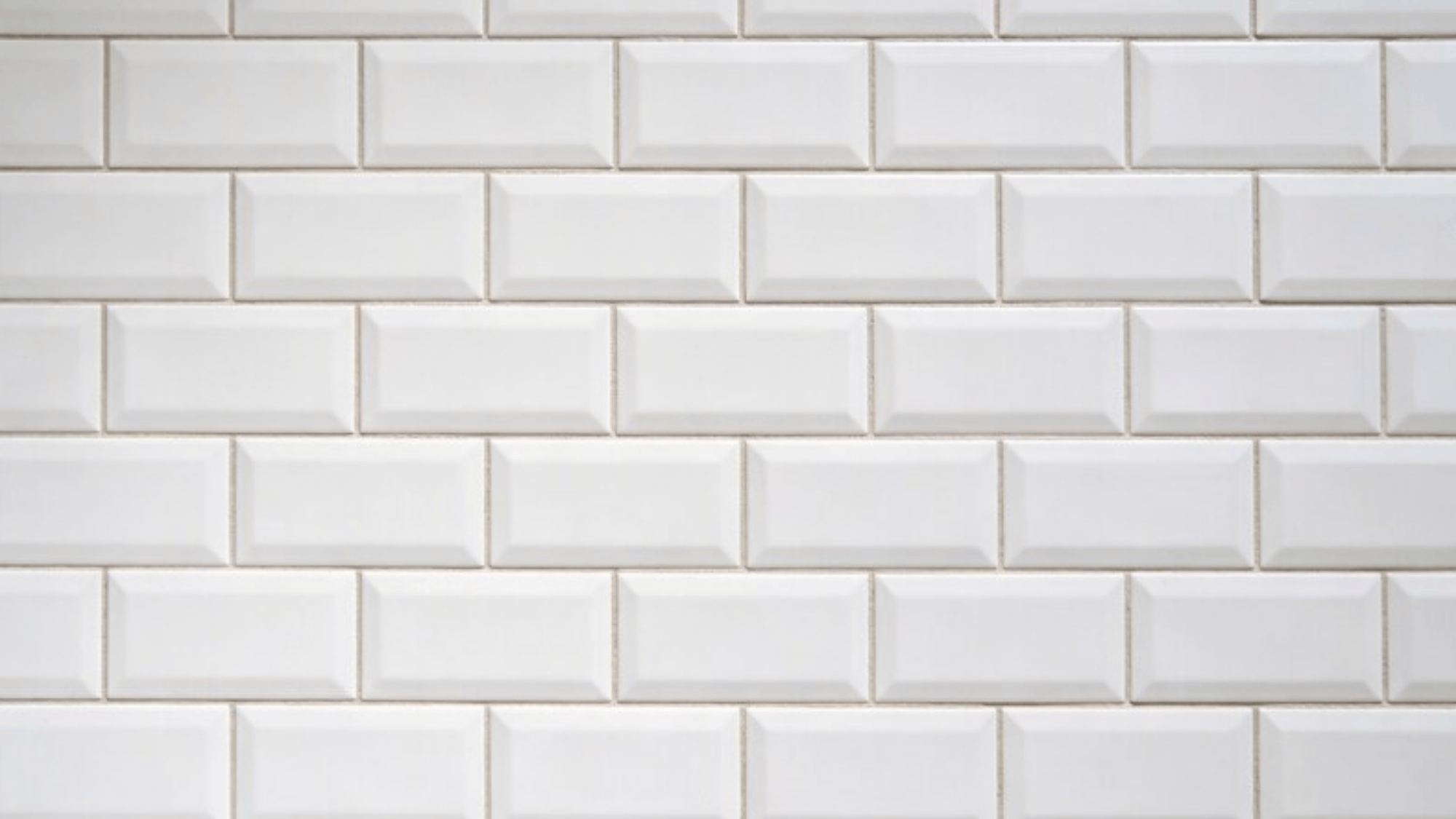 textured off-white subway tiles with consistent horizontal alignment, centered installation, tidy narrow grout