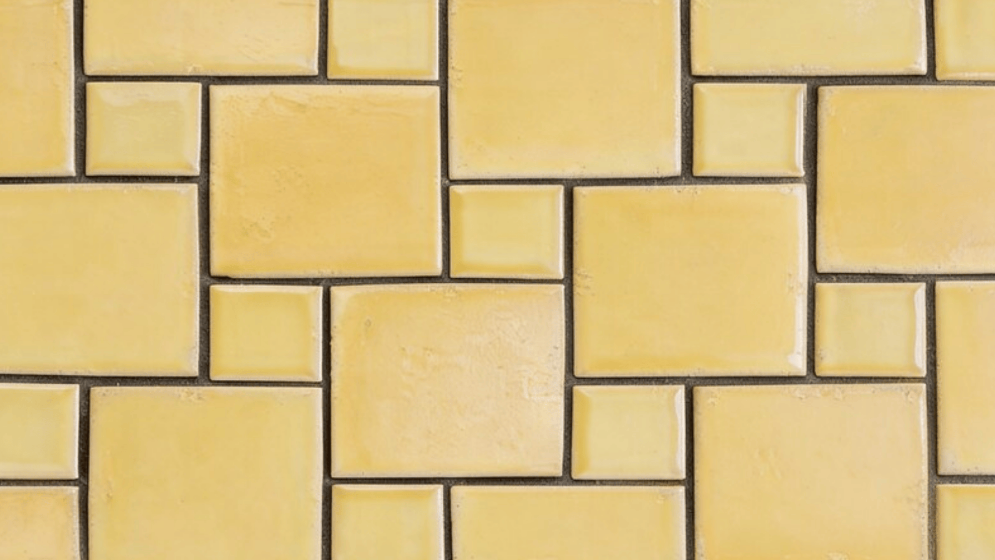 tiles in yellow, vintage encaustic-look tiles with slight wear