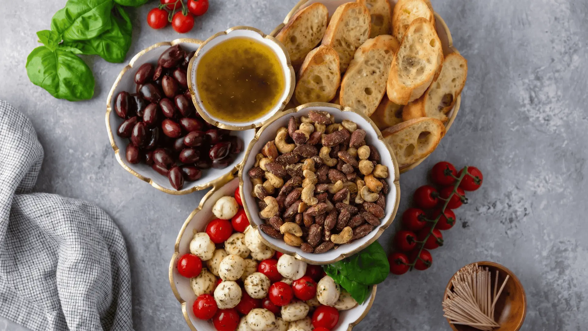 A bowl board with rice or grains, vegetables, proteins, and sauces arranged separately for guests to build their own meal bowls. (1)