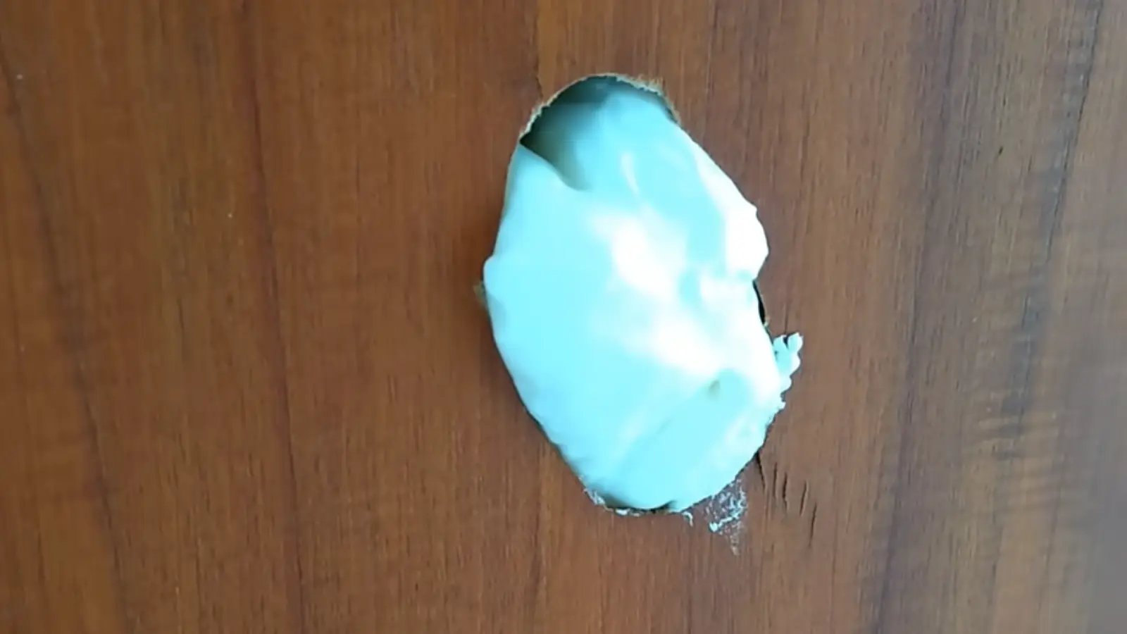 Expanded foam being shaped to fill a damaged area evenly (1)
