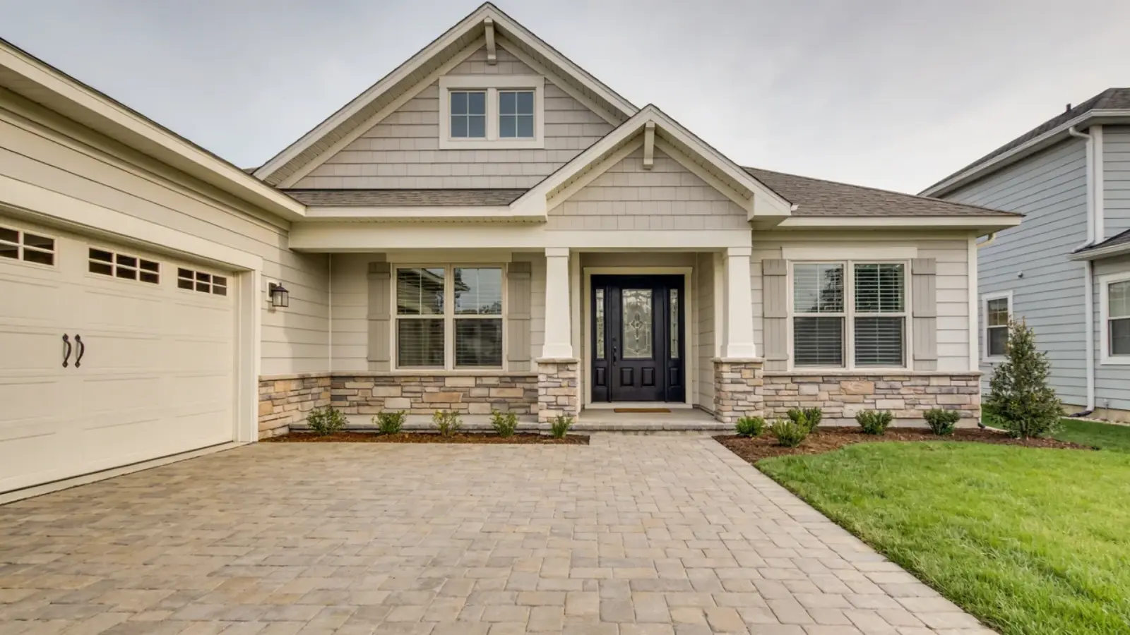 Finished house exterior with clean surroundings and no construction activity