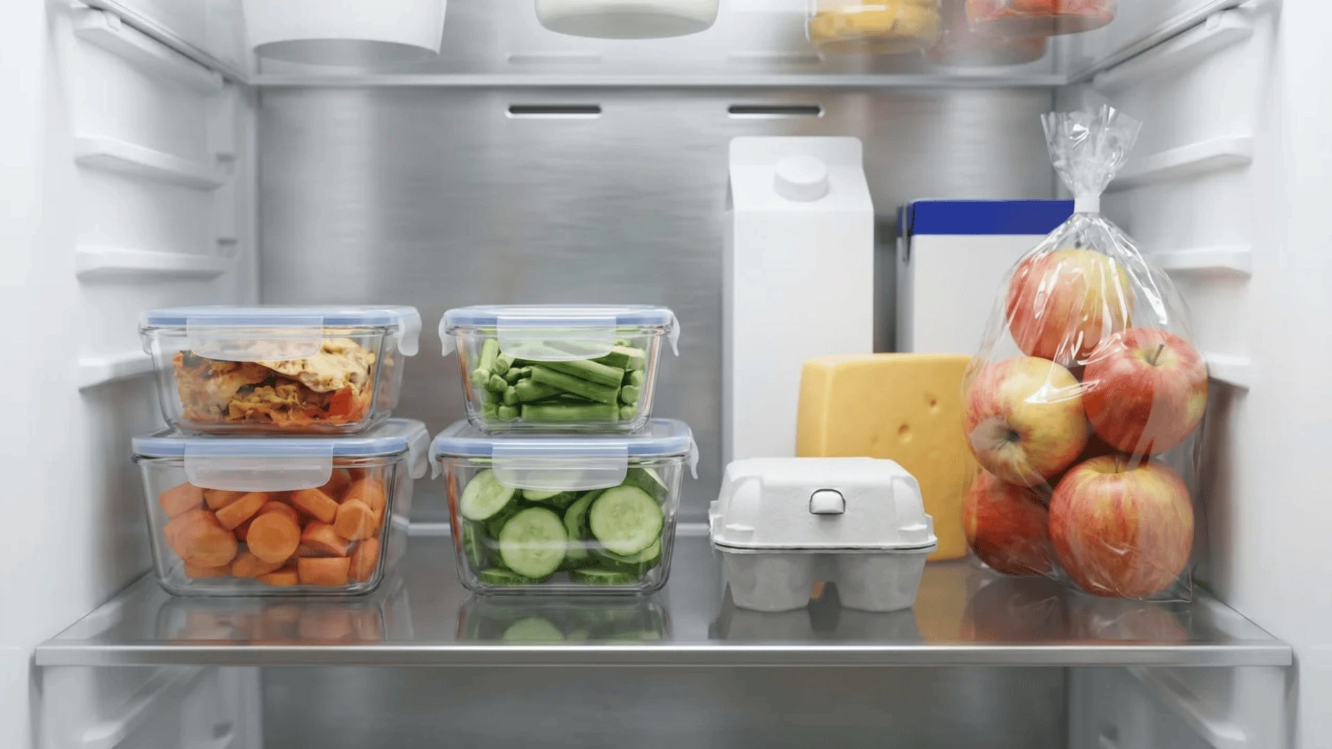 Food containers placed at front of refrigerator shelf for easy access