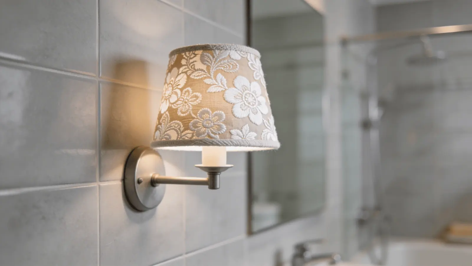 Light fixture with decorative fabric shade in a bathroom