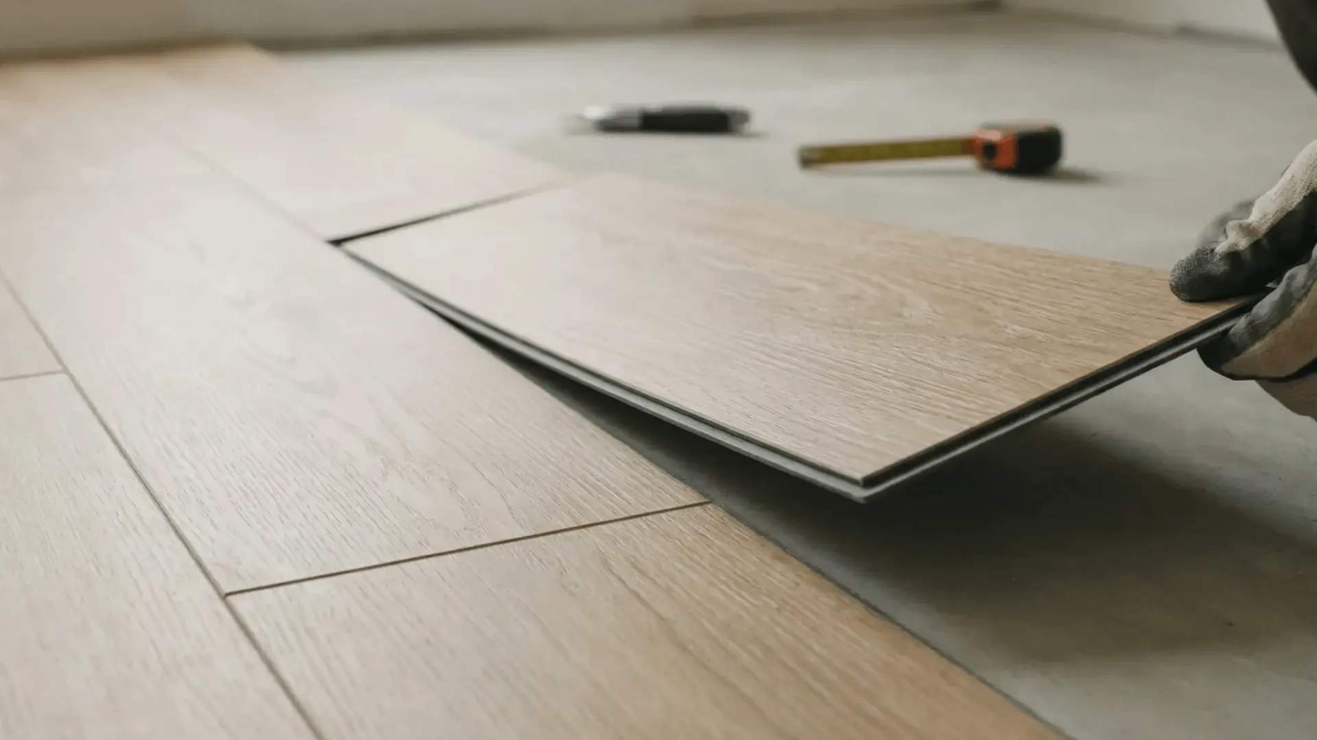 Loose-lay LVT tile placed on a smooth subfloor without adhesive.