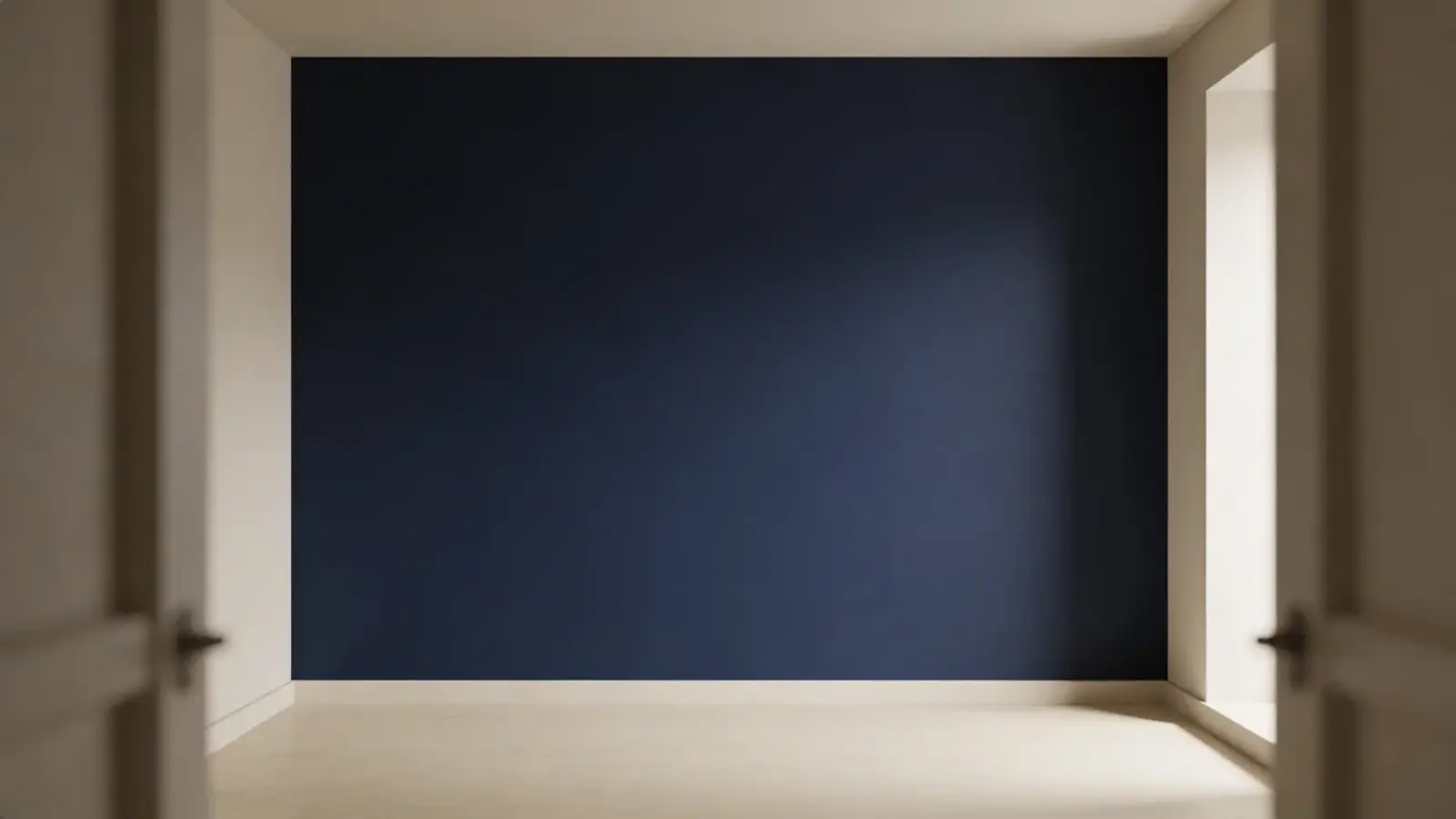 Room with a single dark painted accent wall and minimal interior setup