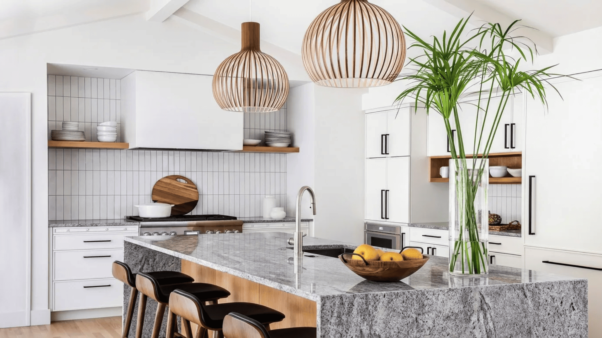 white subway tile in vertical stack bond pattern, white shaker cabinets, grey granite countertop, elongated modern kitchen minimalist aesthetic