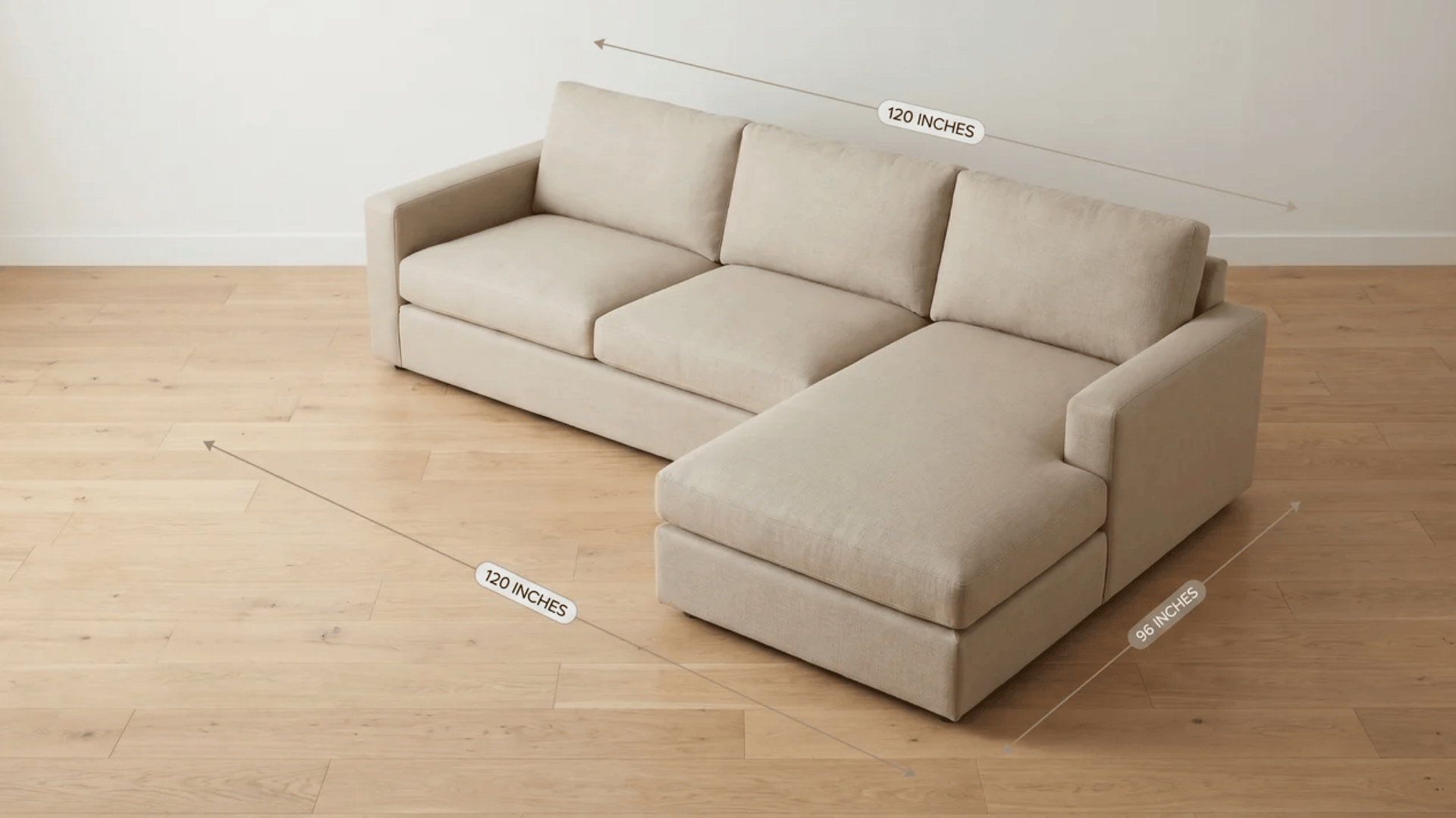 L-shaped sectional sofa viewed from above at an angle with separate measurement lines along the main run and chaise arm.