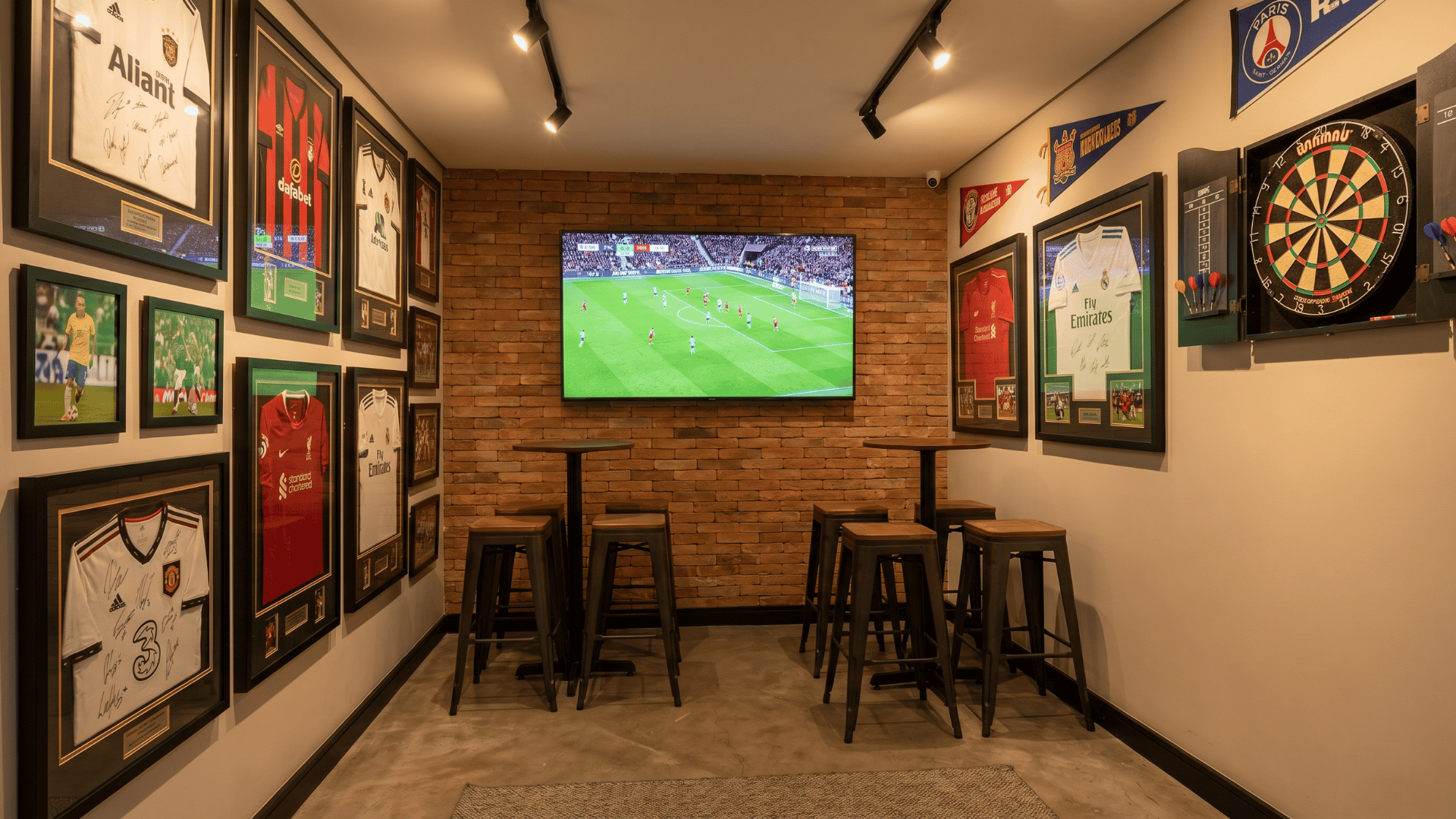 Sports fan zone with TV, stools, and wall memorabilia in a small room