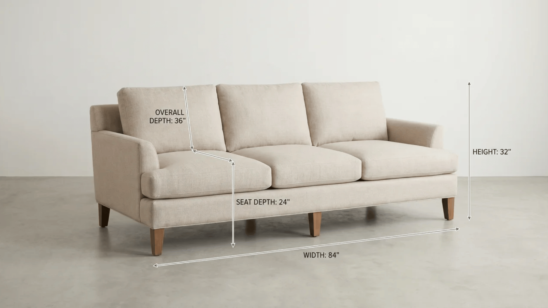 Three-cushion sofa at an angle with separate measurement lines distinguishing overall depth and seat depth alongside width and height.