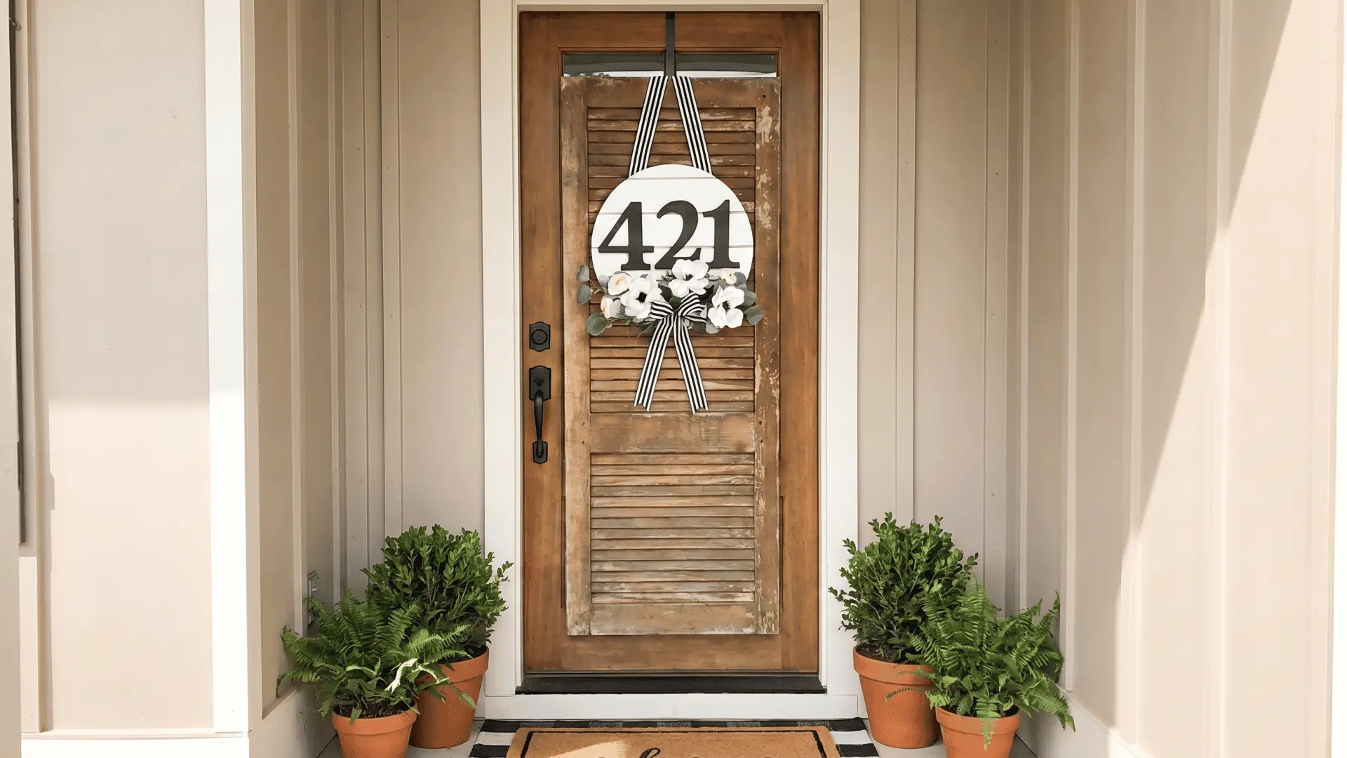 decorative house number display on door