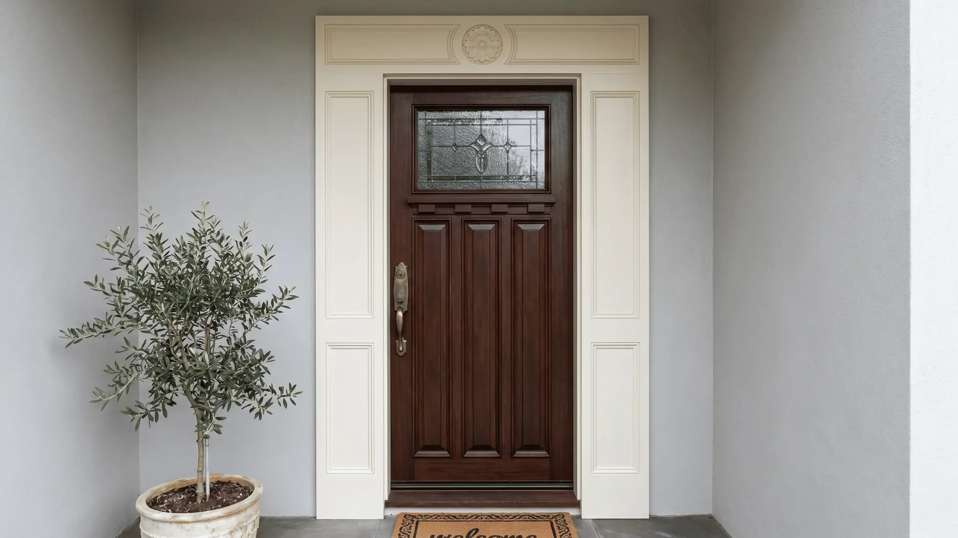 front door framed with trim panels