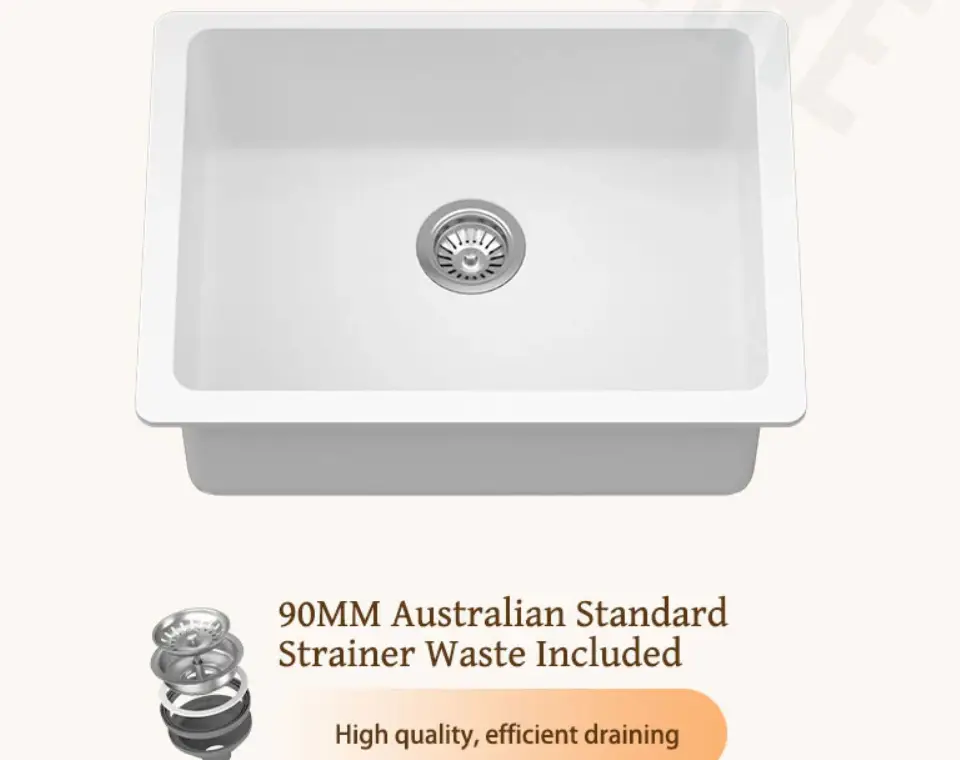 Stainless steel kitchen sink with strainer waste, white countertop background