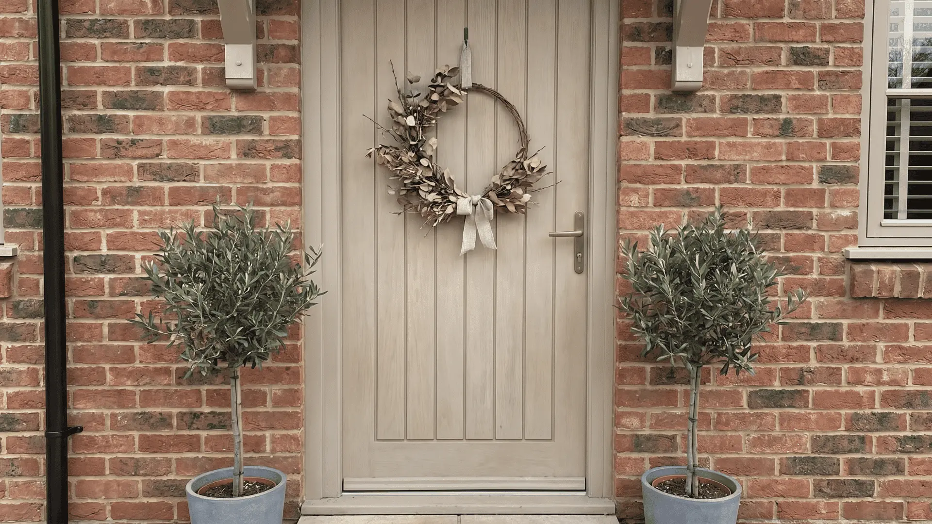 minimal half wreath on front door