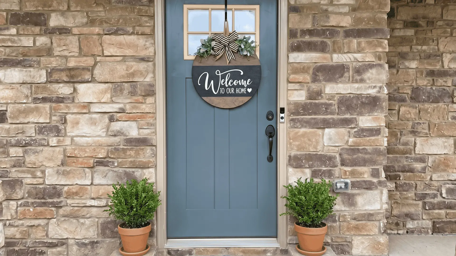 simple welcome sign on front door