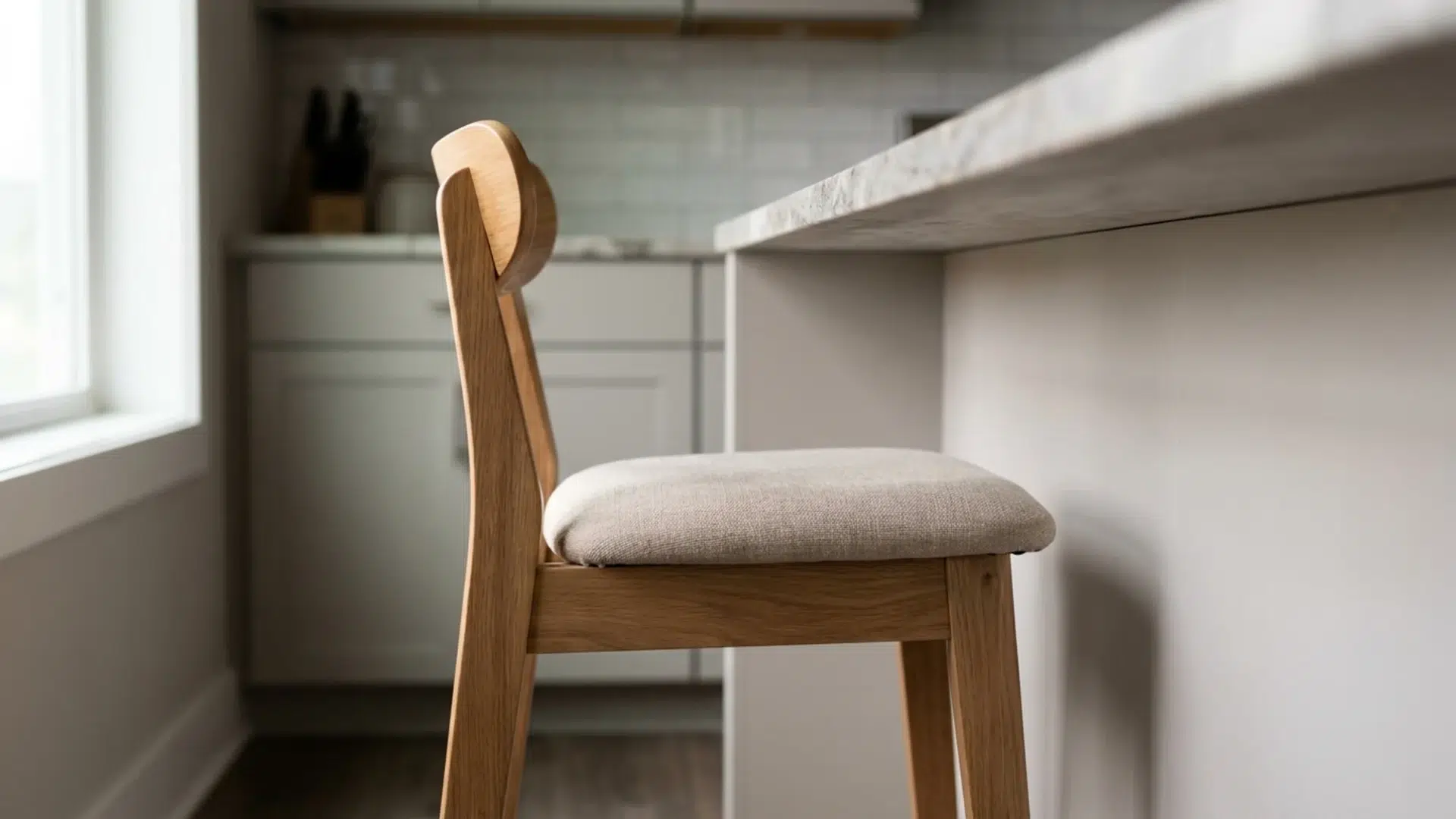 Bar stool under counter showing seat height relative to the bar surface