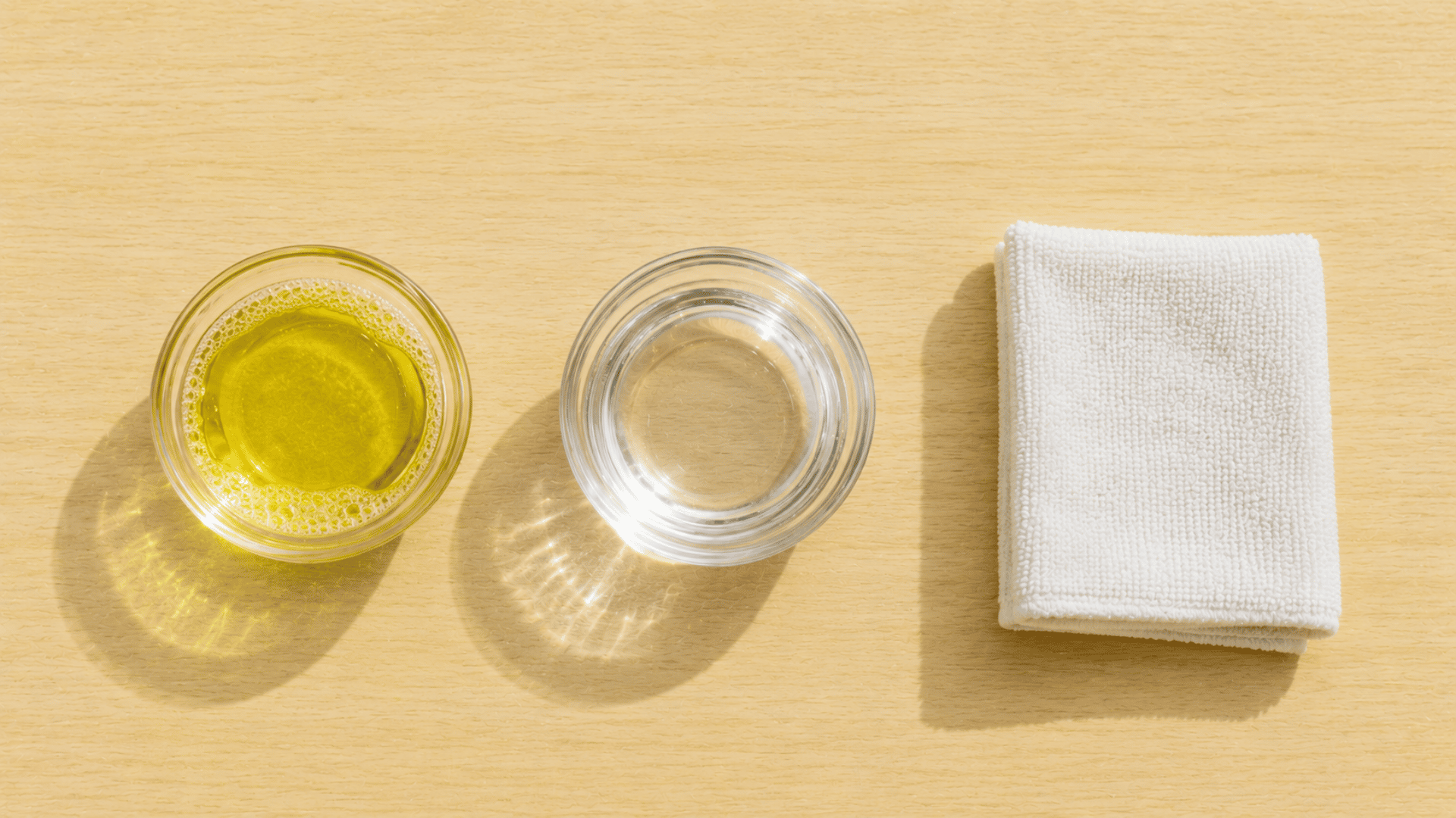 dish soap water and cloth wipe on table