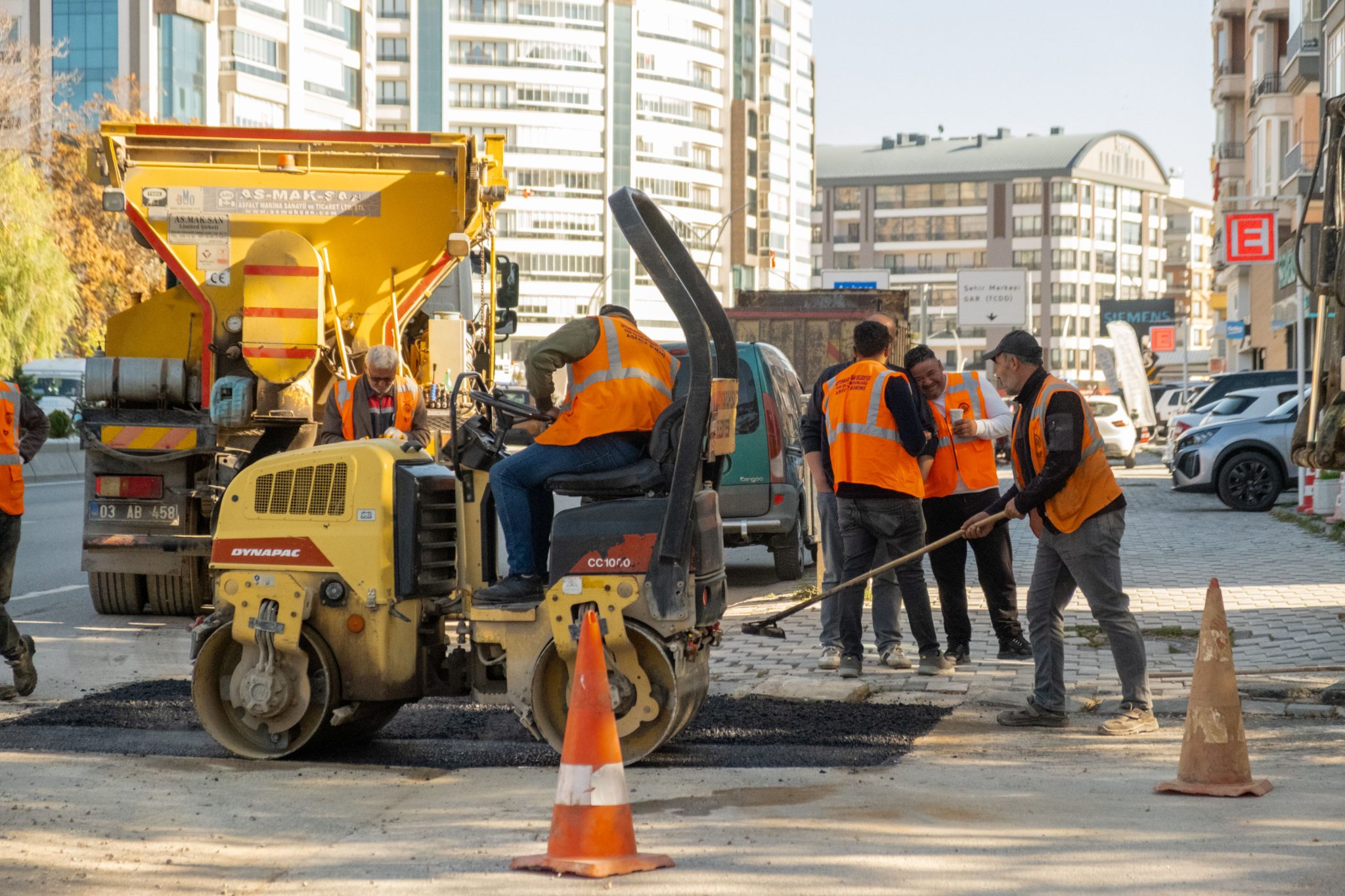 urban-roadwork-crew-using-heavy-equipment