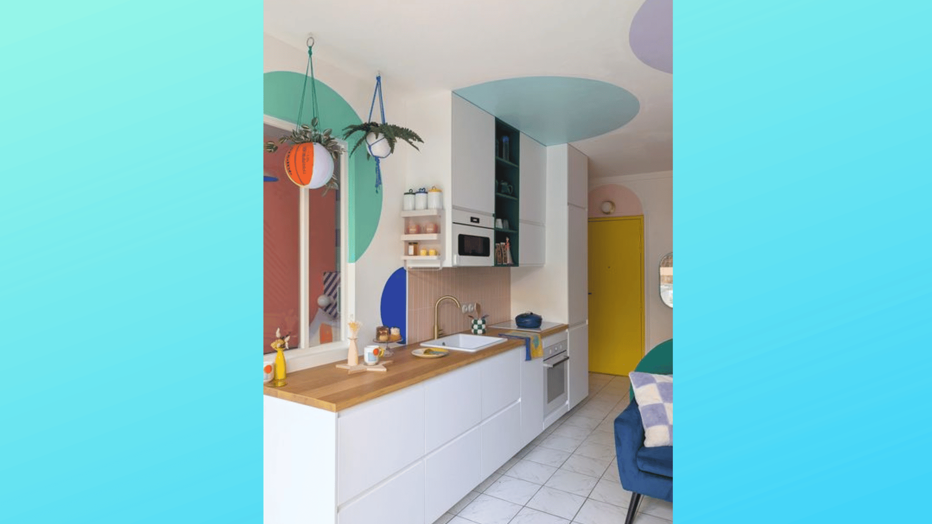 postmodern kitchen with pastel color blocks, yellow door, white cabinets, wood countertop, and hanging plants