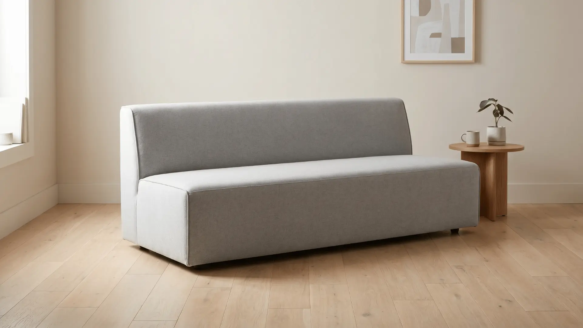 Armless sofa with straight seat and no side arms in a small room