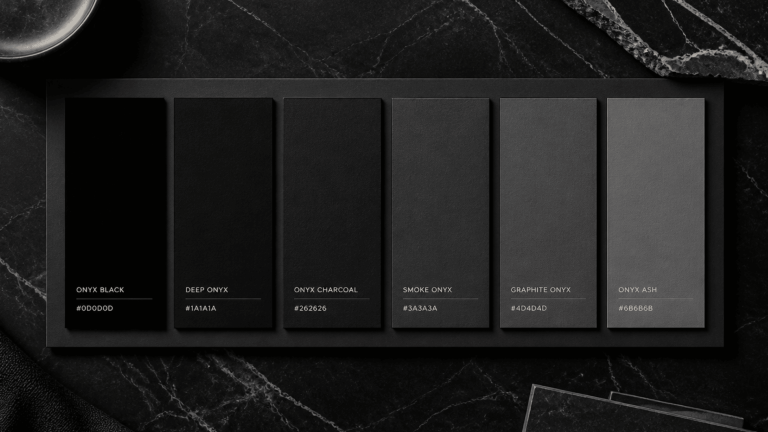 onyx color palette guide showing black and charcoal shade swatches with hex codes on a dark marble background