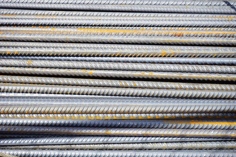 How Do Synthetic Fibers Compare to Traditional Steel Reinforcement in Construction?