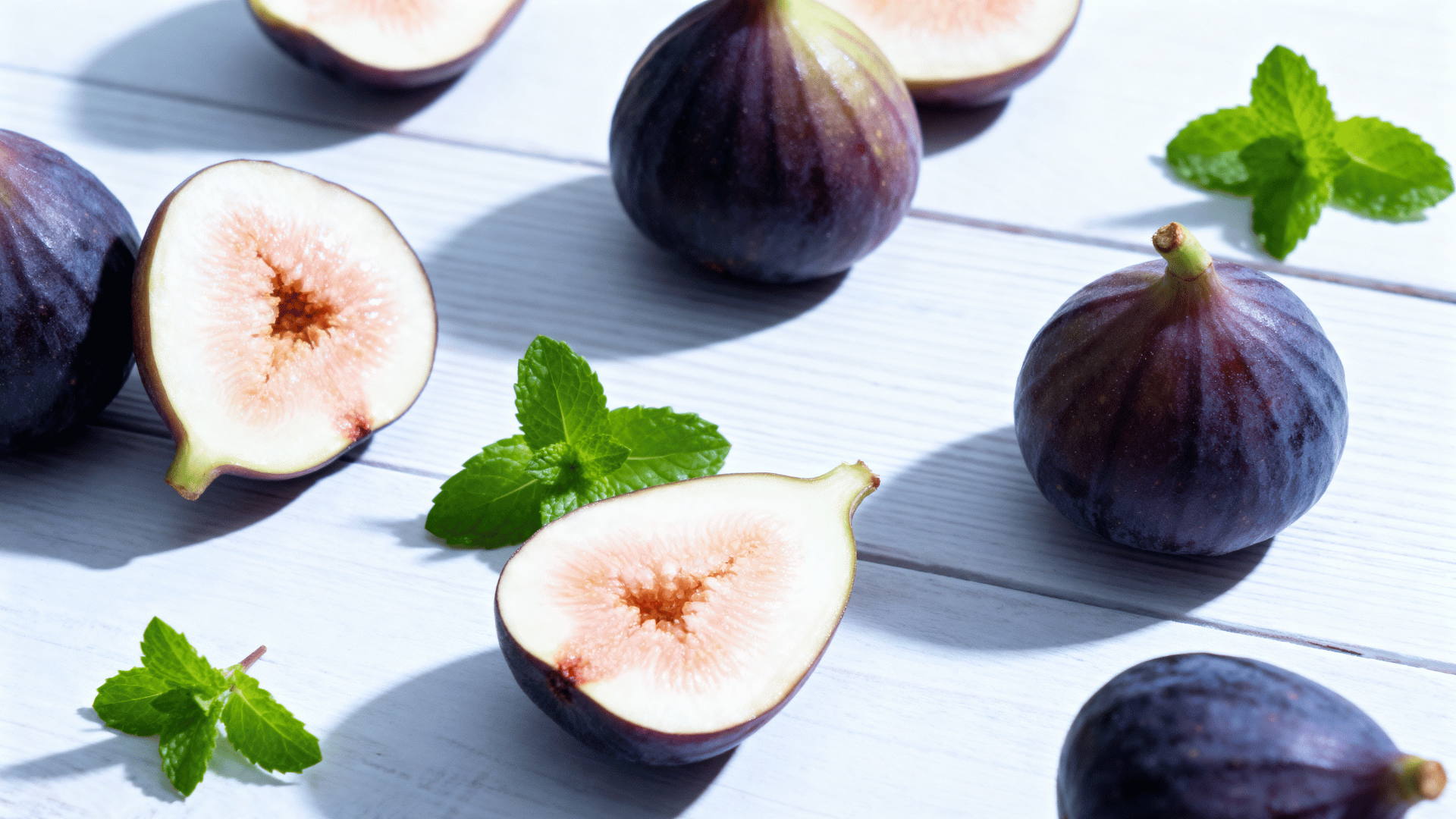 sierra figs light green skin on wood sliced showing pale interior soft natural light