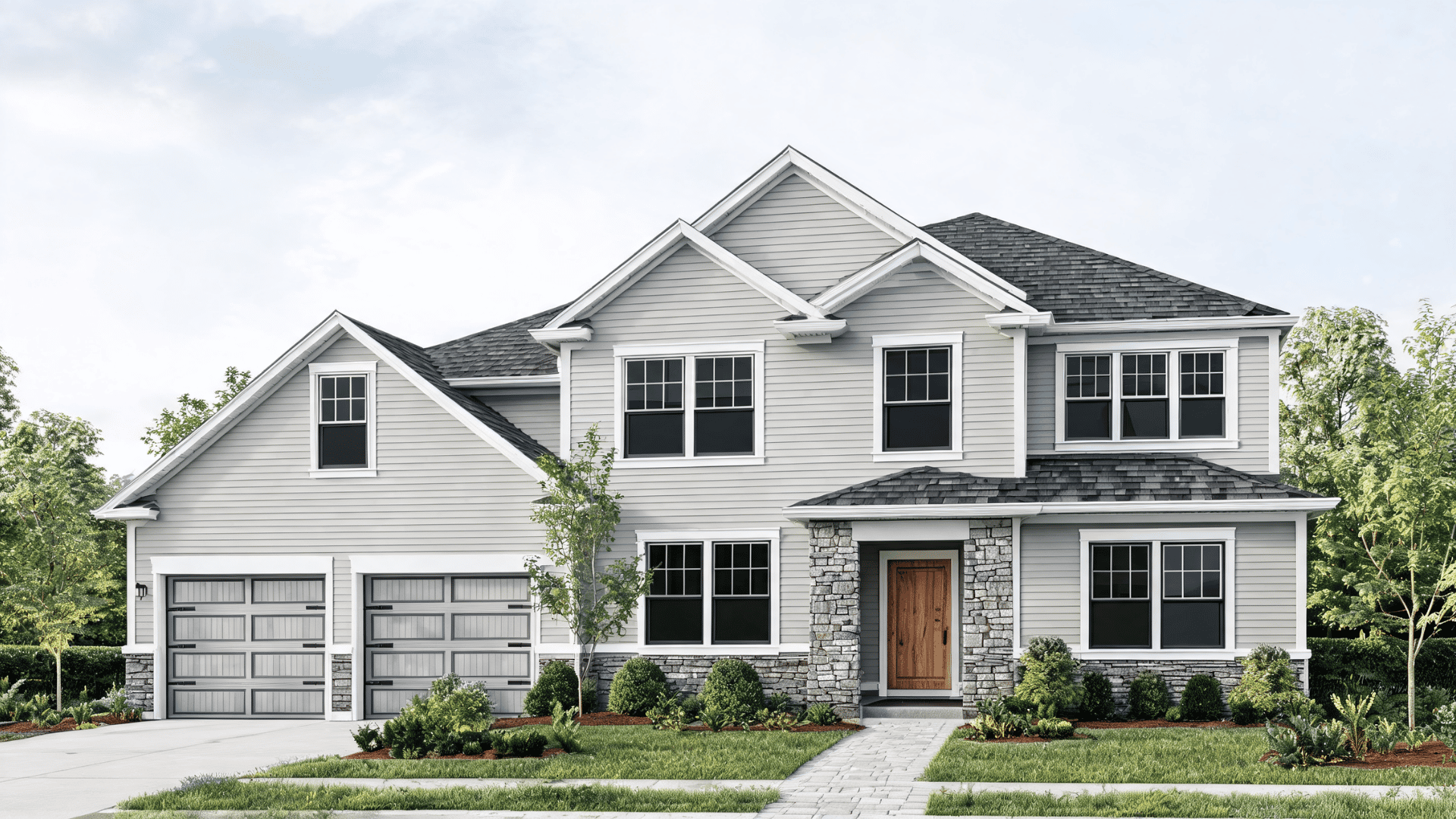 Gray exterior house paint ideas featuring a light gray home with dark trims, stone accents, and natural wood details.