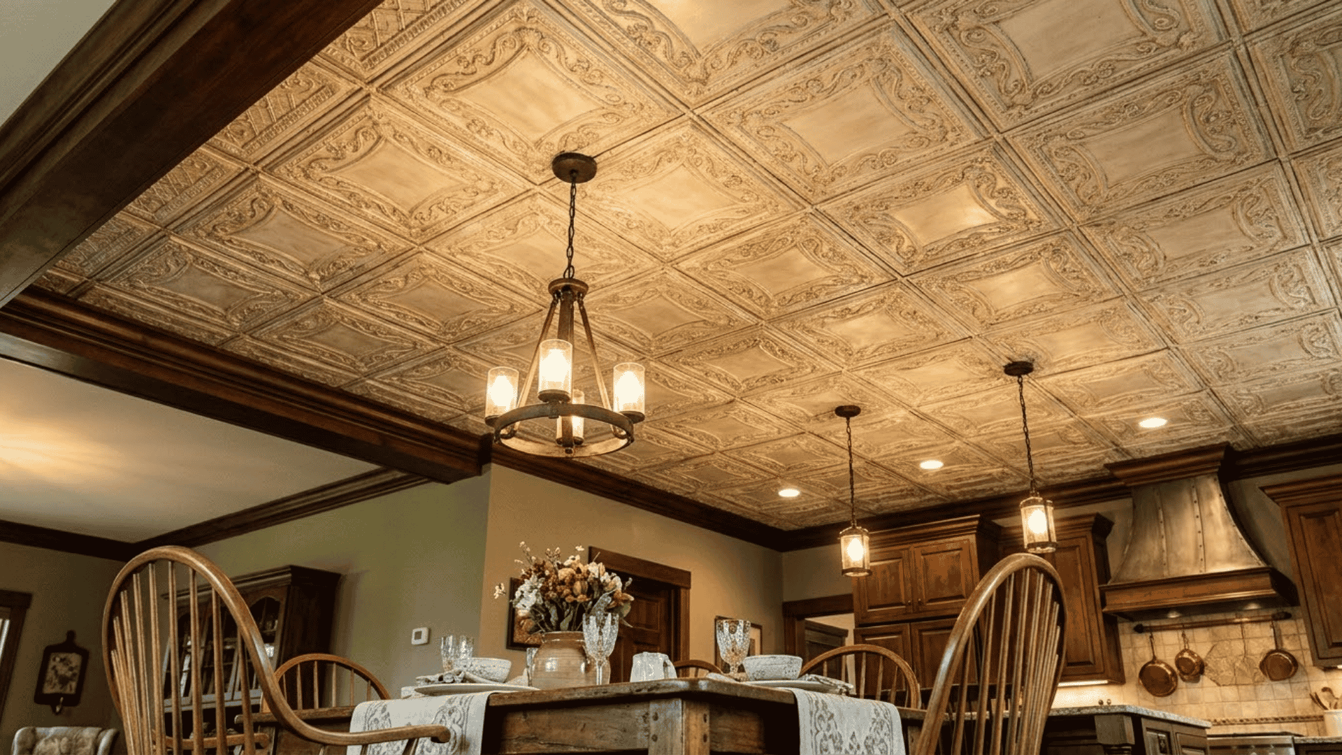 Embossed tin-style metal ceiling panels with decorative patterns in an interior room