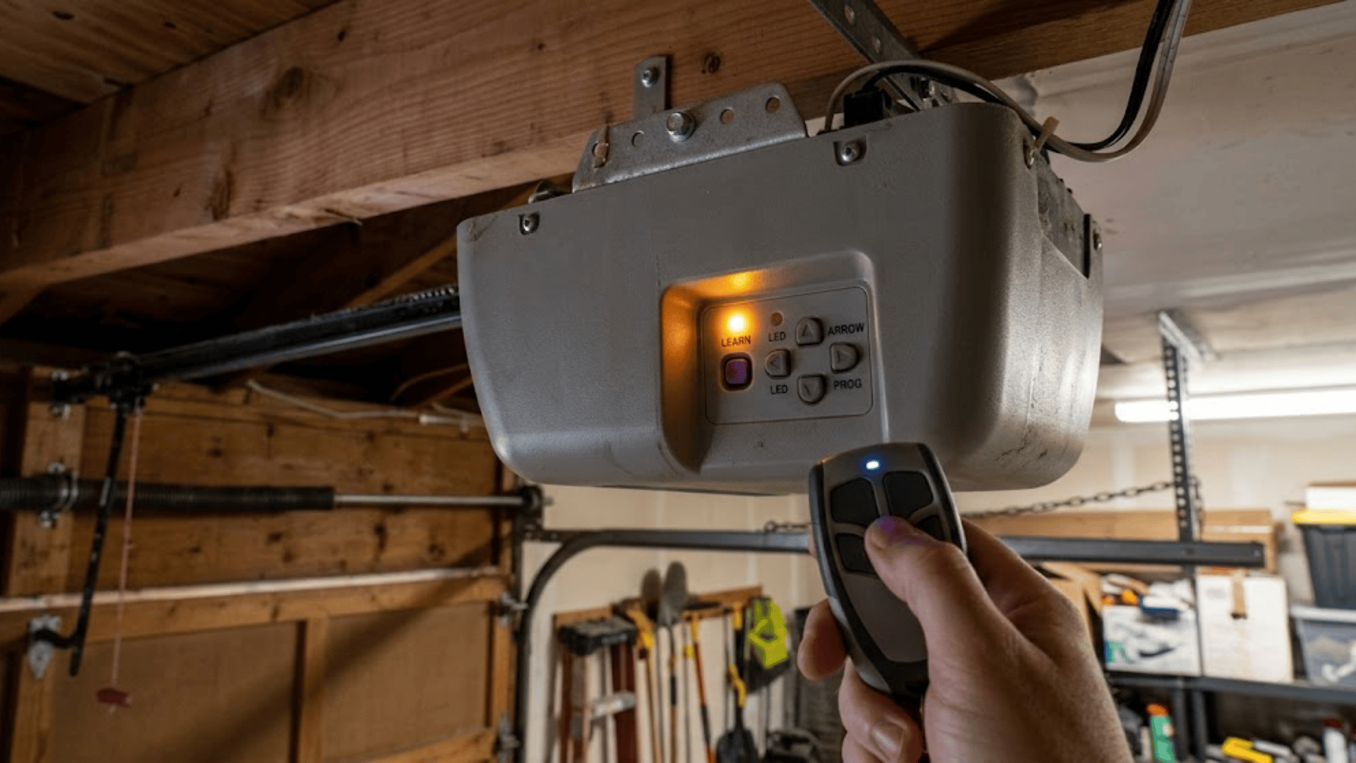 How to program a garage door opener by pairing a remote with the Learn button on the motor unit