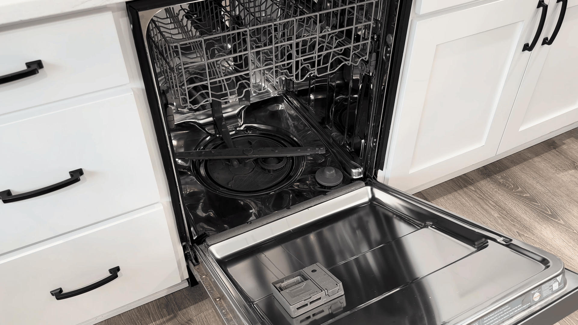Running a dishwasher test cycle after fixing drainage problems
