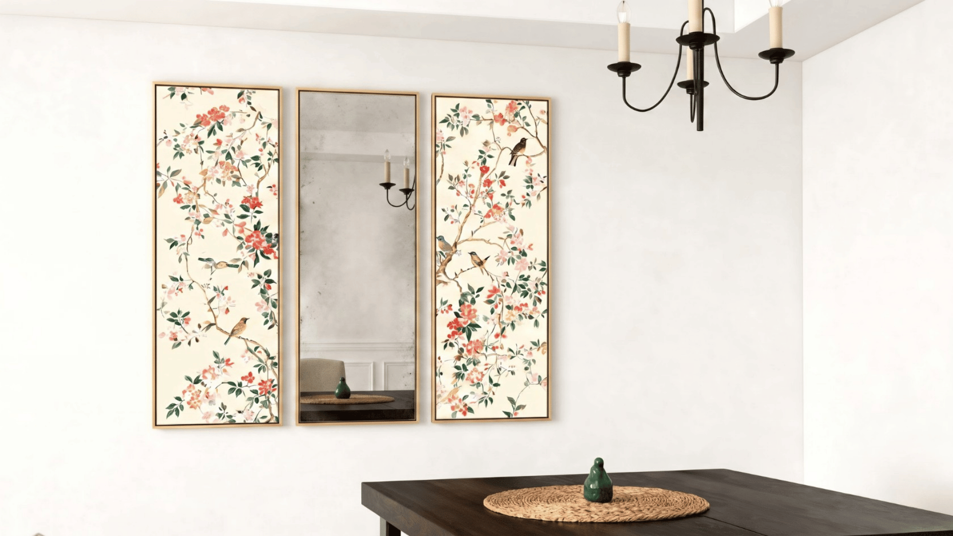 Framed floral wallpaper panels on a wall above a dining table with decor items